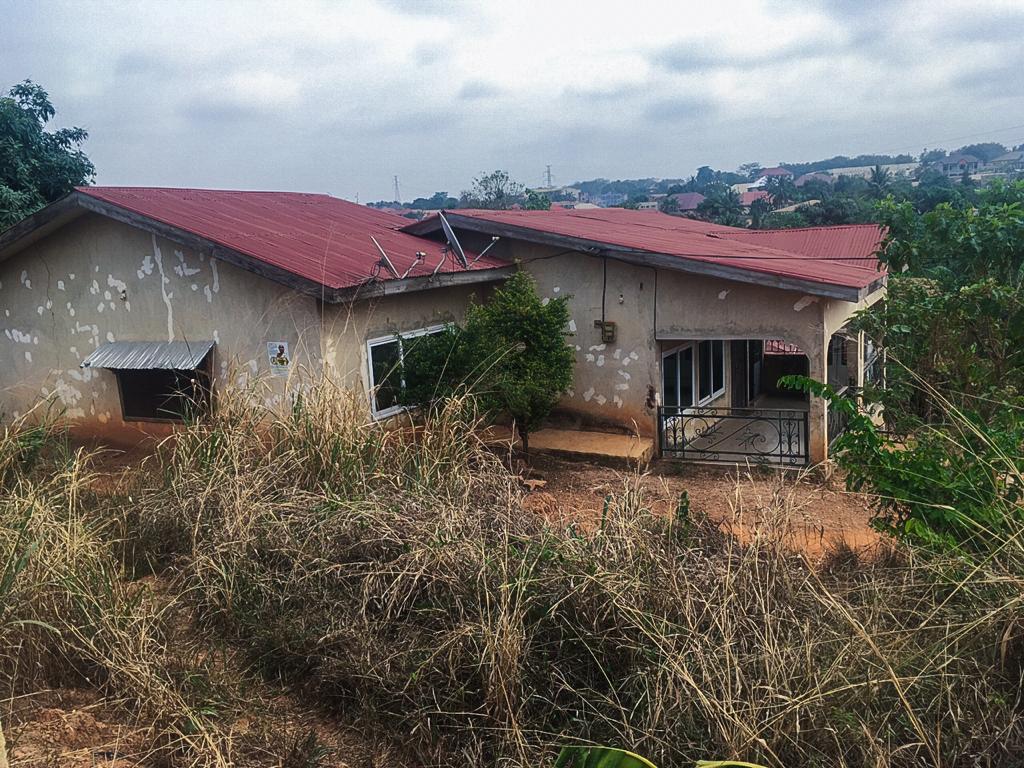 100 x 110 ft ridgy land with building on it for redevelopment