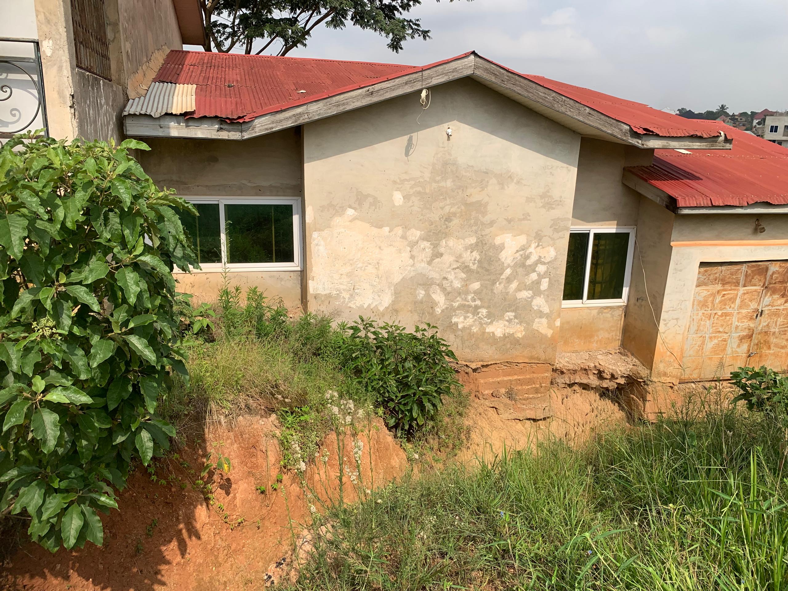 100 x 110 ft ridgy land with building on it for redevelopment