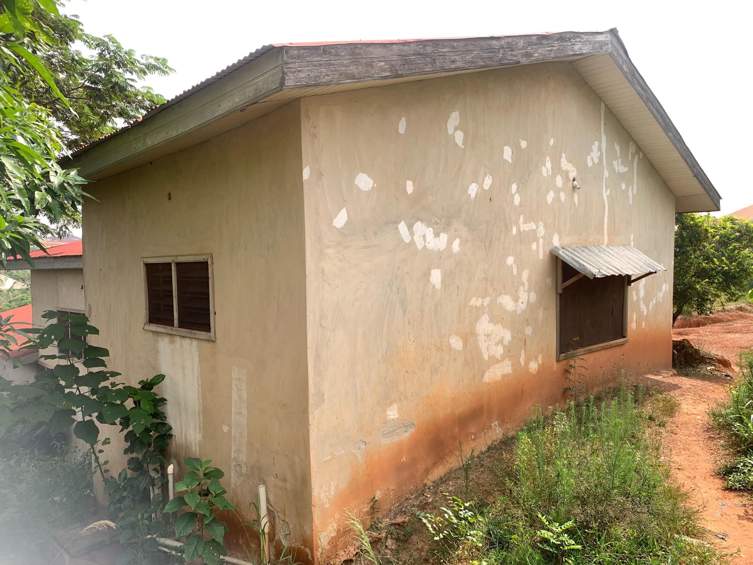 100 x 110 ft ridgy land with building on it for redevelopment