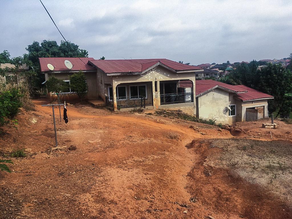 100 x 110 ft ridgy land with building on it for redevelopment